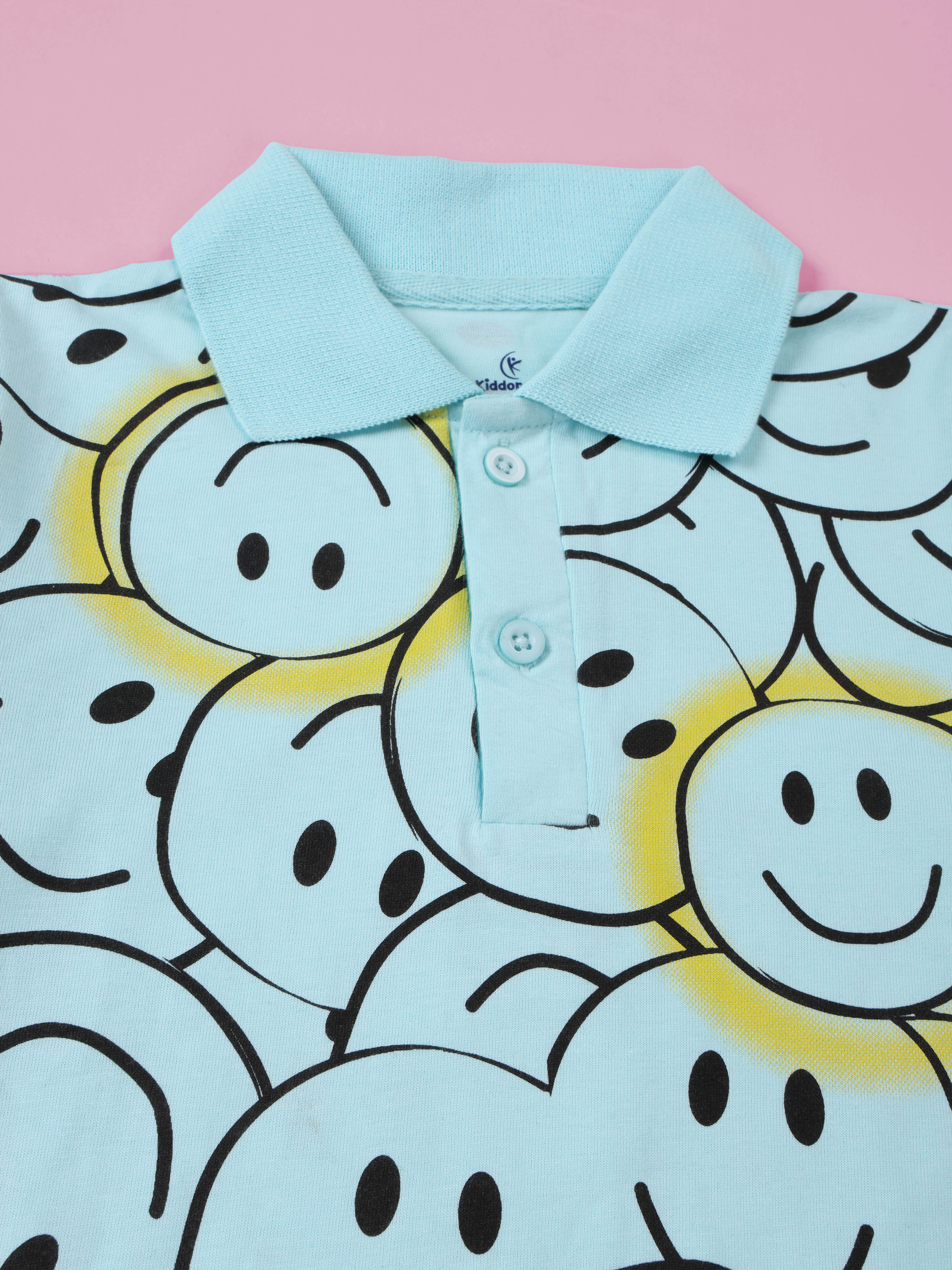 Kiddopanti Boys Smiley AOP Printed Polo Tee & Regular Fit Denim Pant Coorde Set