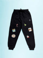 Kiddopanti Boys Solid Fleece Jogger Track Pant With Christmas Themed Badges - Black / 1-2Y
