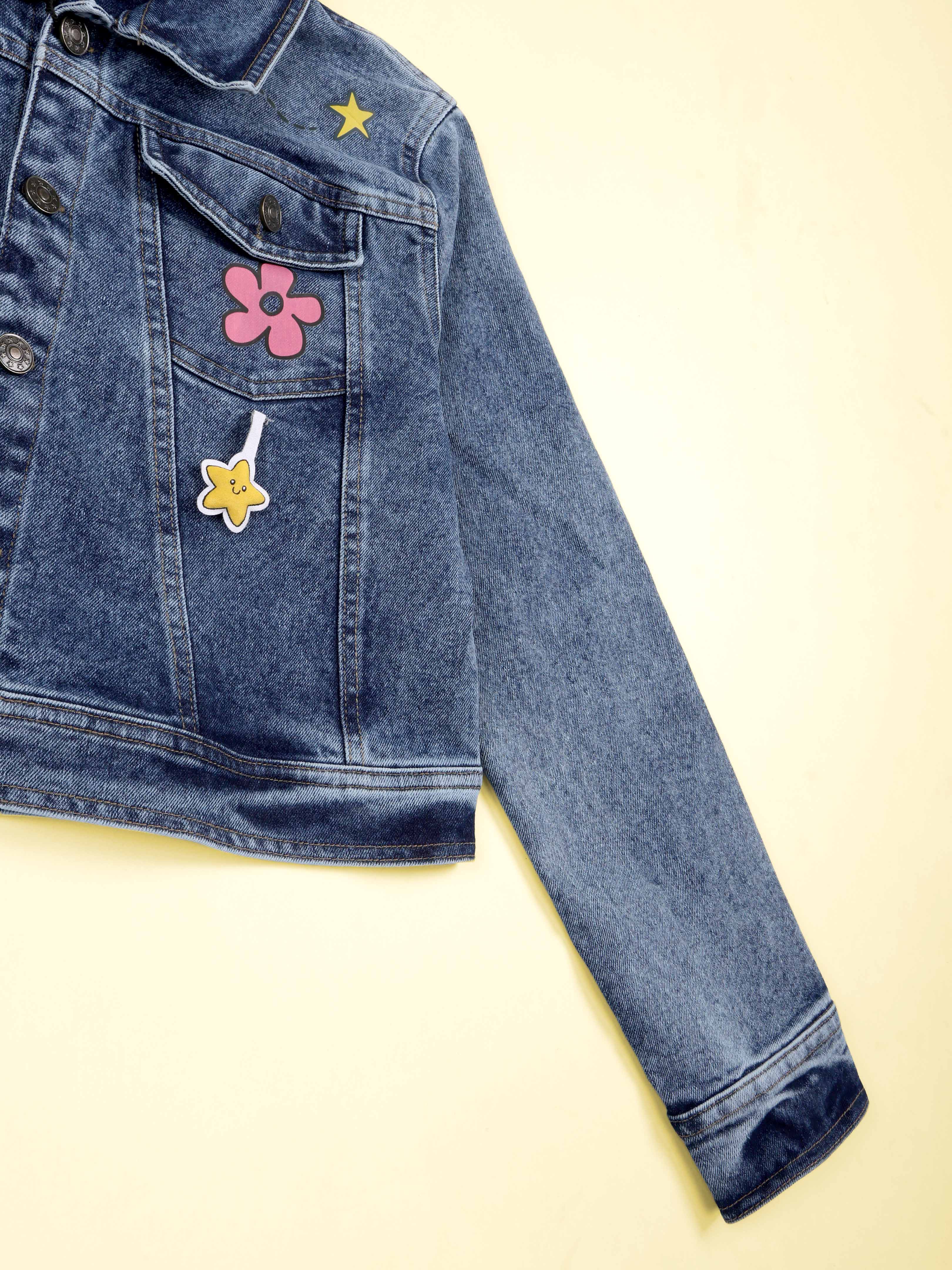 Kiddopanti Girls Denim Woven Multi Star Printed and Badges Crop Jacket