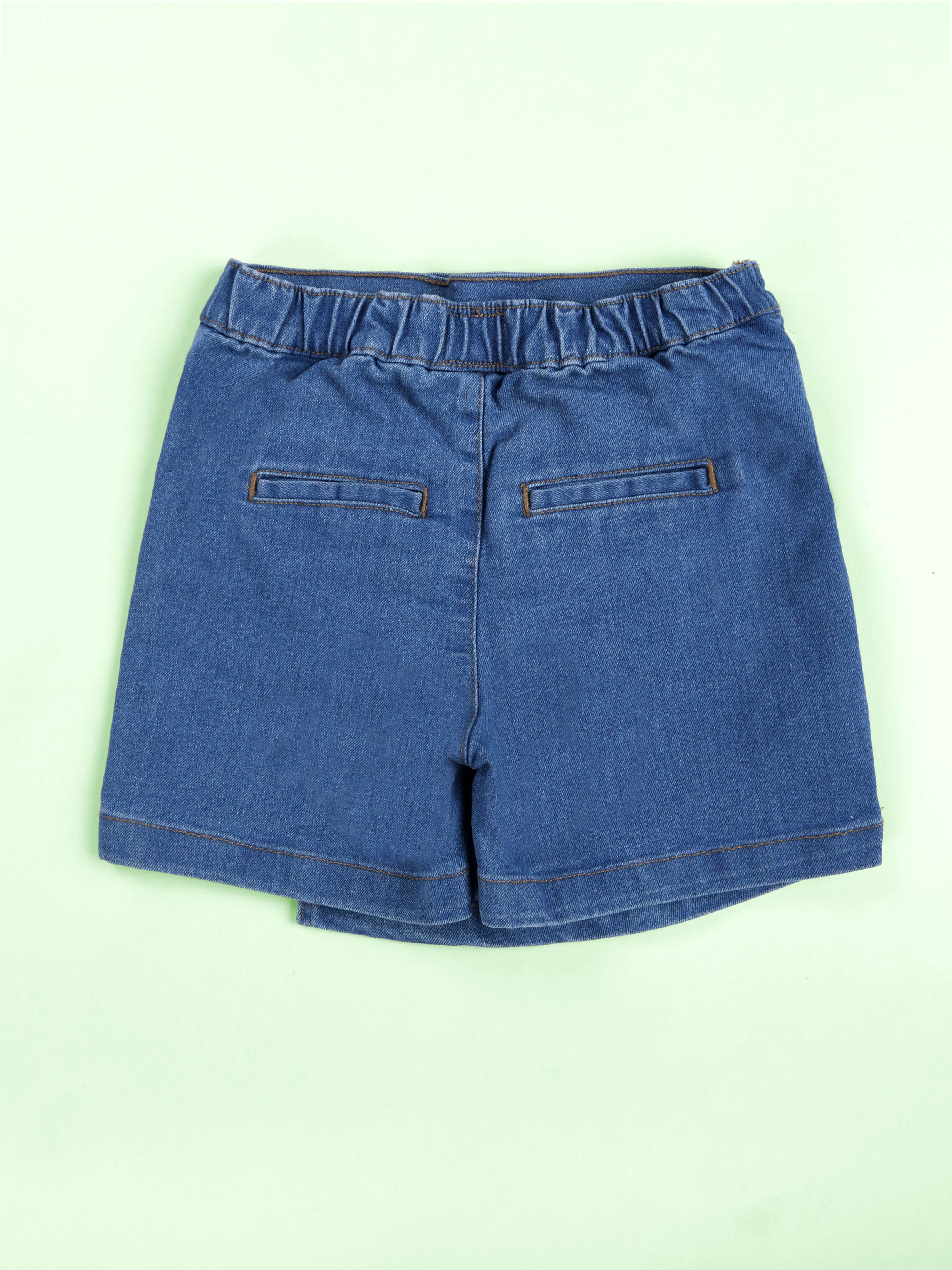 Kiddopanti Girls Solid Polo Tee With Cotton Over Lap Skort With Flowers and Pearls Set