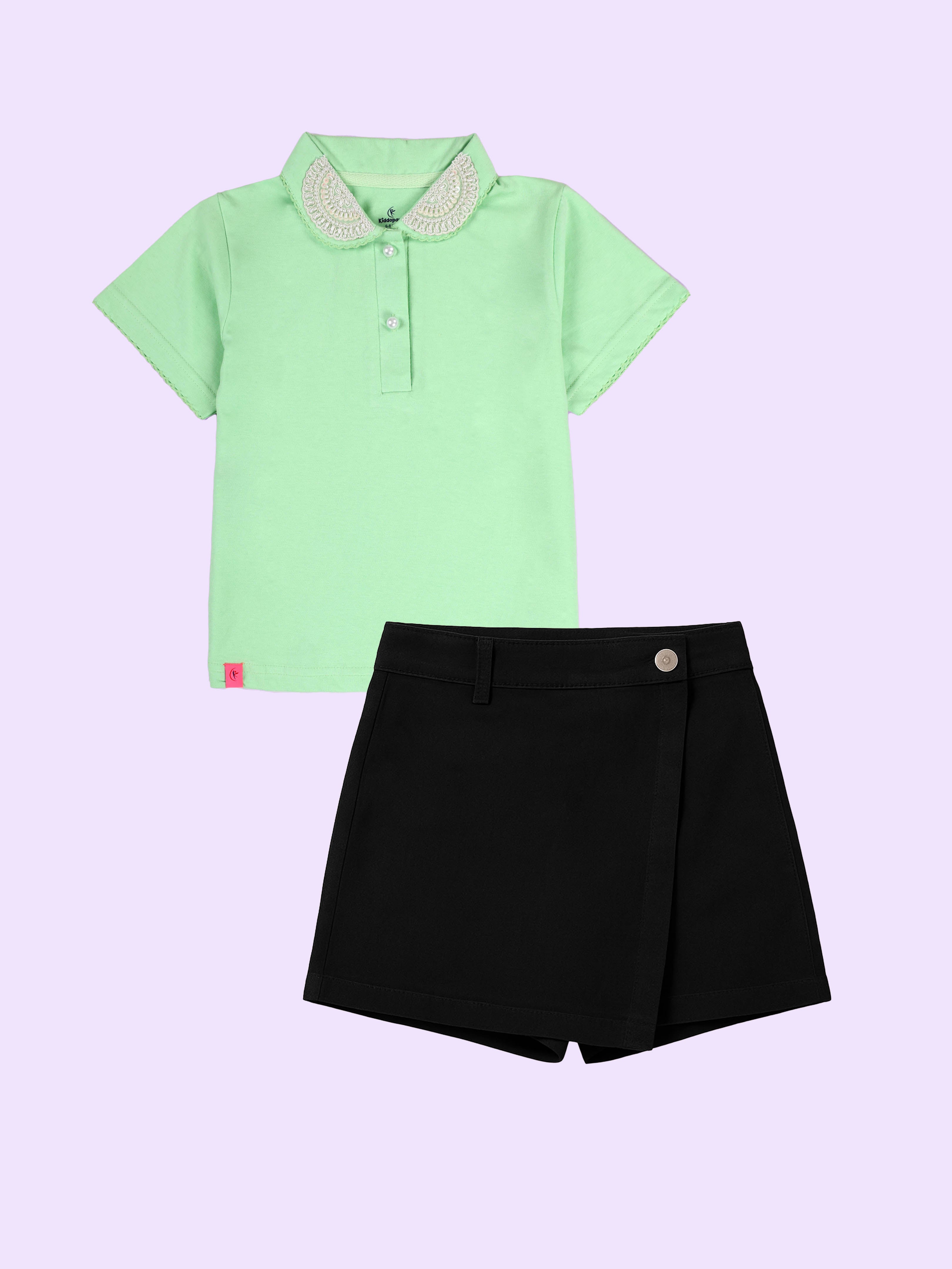 Kiddopanti Girls Solid Polo Tee With Cotton Over Lap Skort With Flowers and Pearls Set