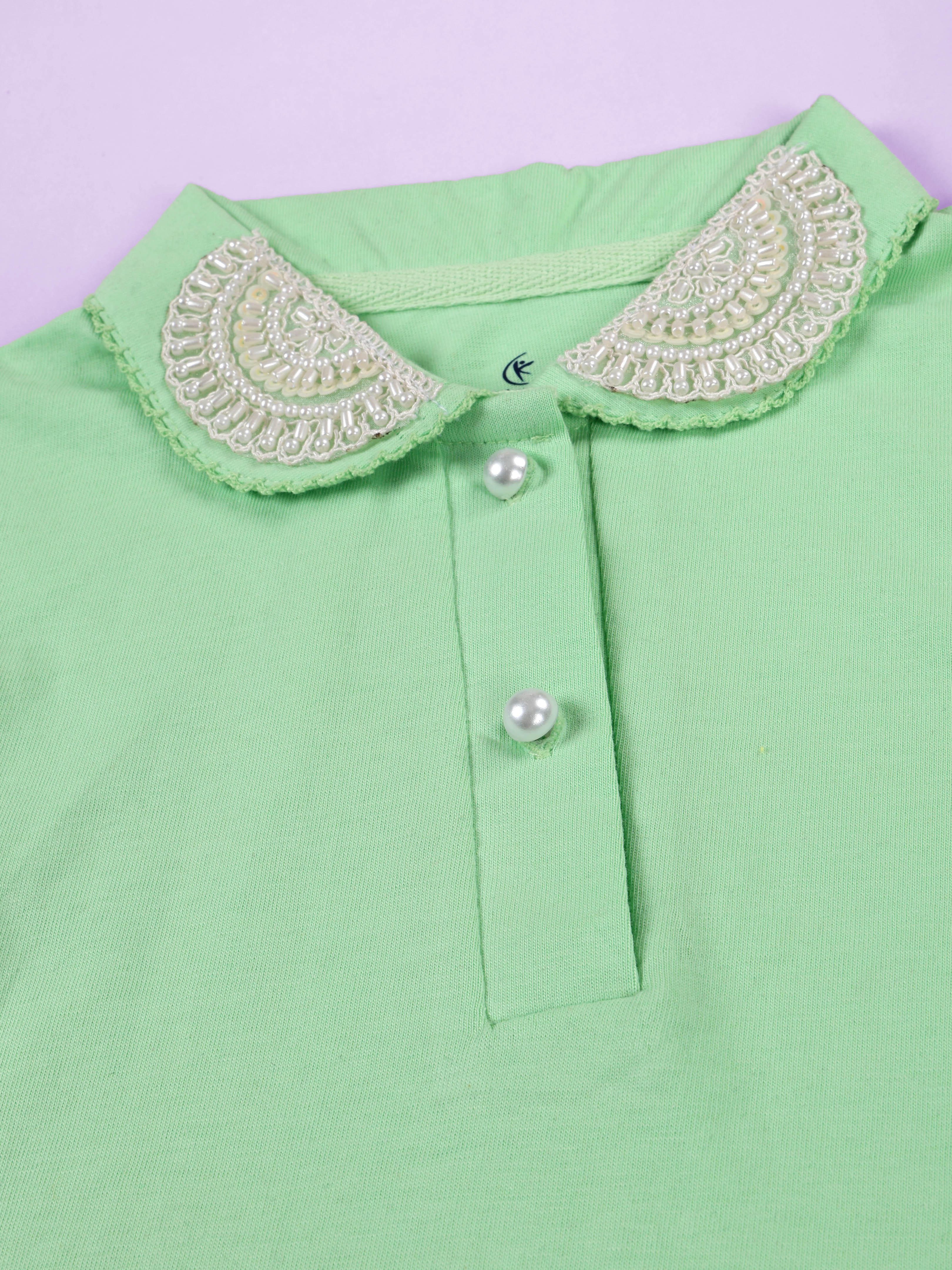 Kiddopanti Girls Solid Polo Tee With Cotton Over Lap Skort With Flowers and Pearls Set