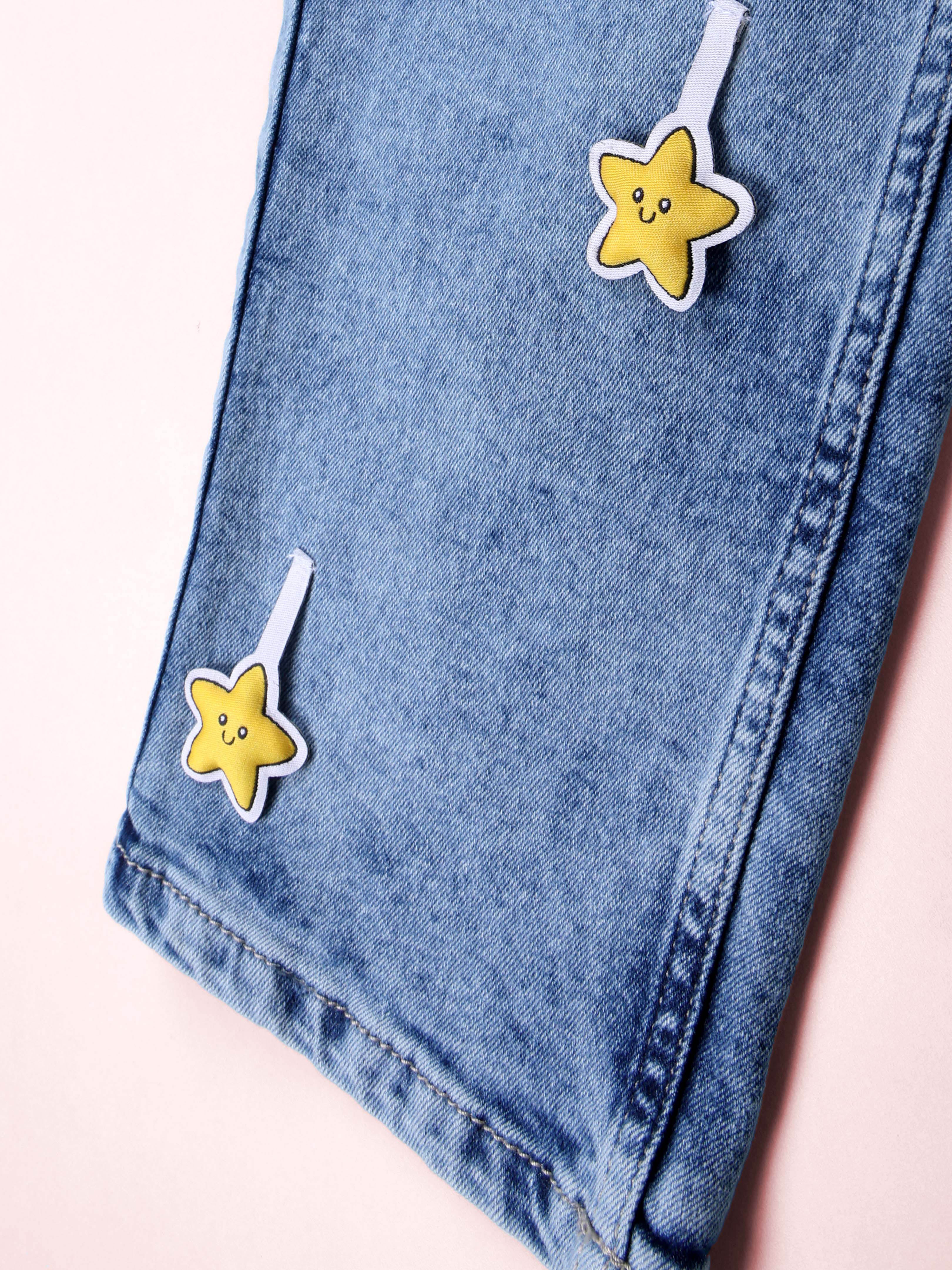 Kiddopanti Girls Fleece Printed Round Neck Multi Badge Sweatshirt  With Straight Fit Jeans Set