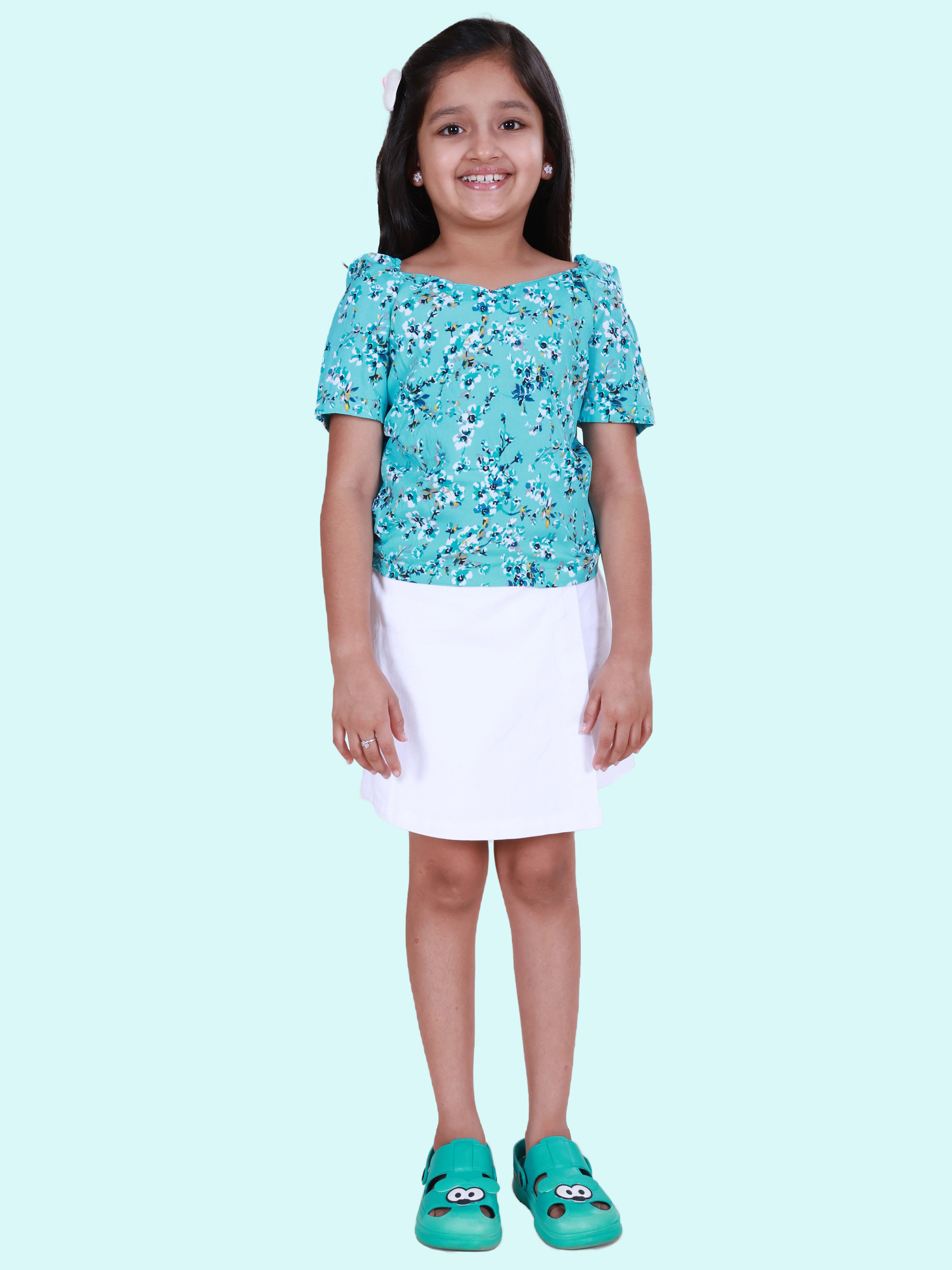 Girls Georgette Woven Ruched Sleeves Floral Printed Top & Cotton Woven Over Lap Skort Co-ord Set