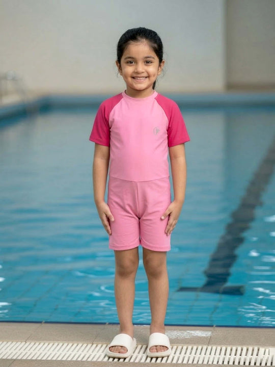 Kiddopanti Boys & Girls Polyester Spandex Half Sleeves Solid Mid Thigh Length Swim Suit